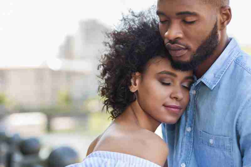 couple hugging reflecting challenges of age effects on fertility