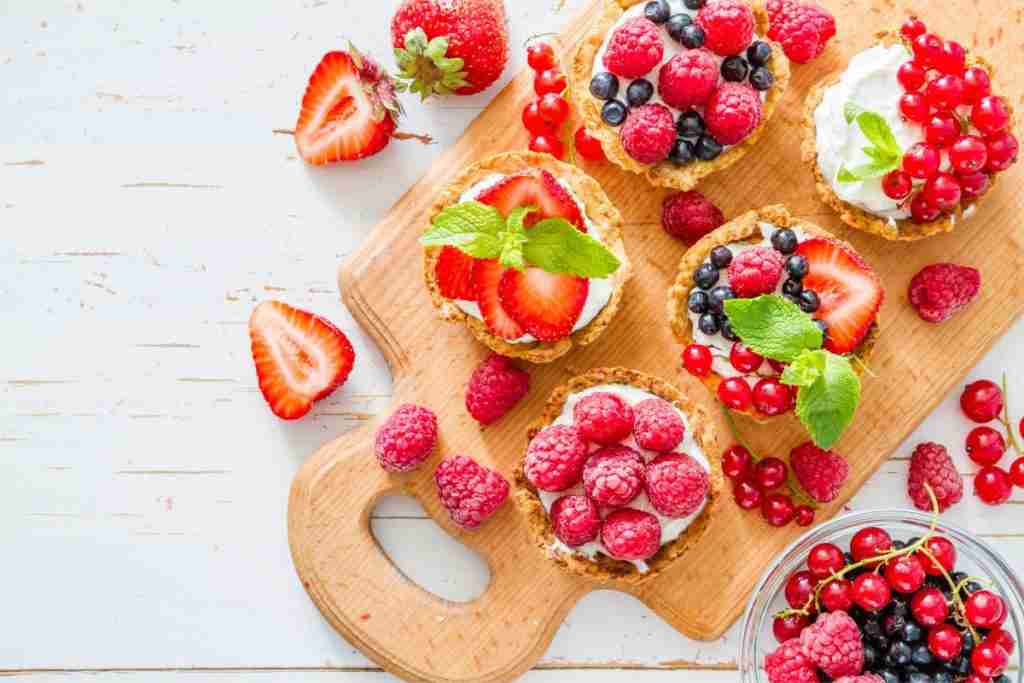 Wooden tray of mixed berries in your diet are superfoods