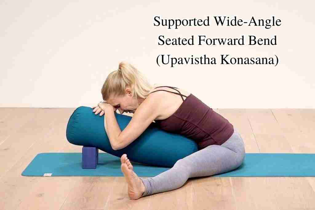 Yoga for managing fibroids - Supported Wide-Angle Seated Forward Bend (Upavistha Konasana)