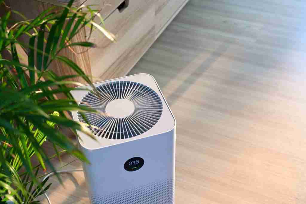 Air purifier on a wooden floor can help internal heat symptoms