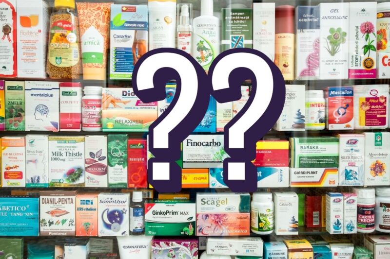 Image shows an array of supplements in a chemist shop - making it tricky to choose the best menopause supplements