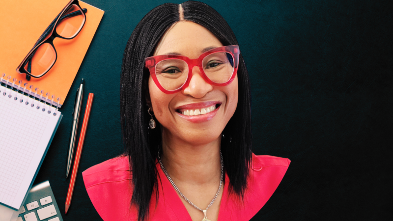 Smiling lady of African heritage in red top and bright red glasses identified as Dr Sylvia, Founder Askawayhealth