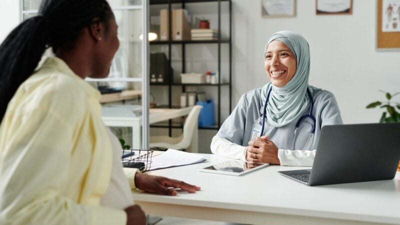 Female GP calmly explaining why you should never ignore a vaginal or vulval lump and when to seek medical advice